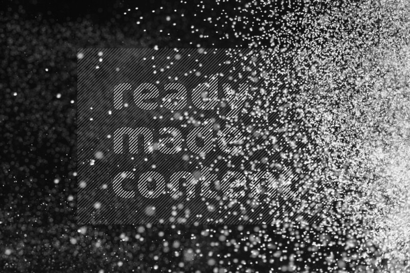 Snow spray on black background
