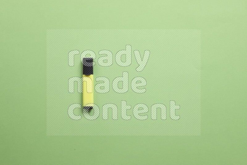 Multicolored highlighter pens on green background