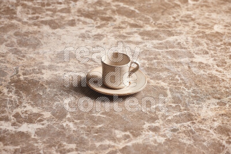 Pottery Cup on Beige Marble Flooring