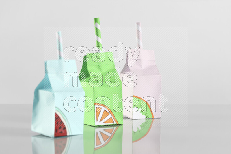 Origami juice box on grey background