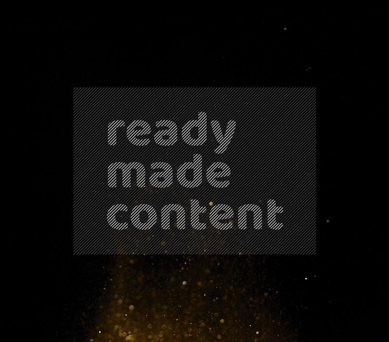 Gold glitter powder isolated on black background