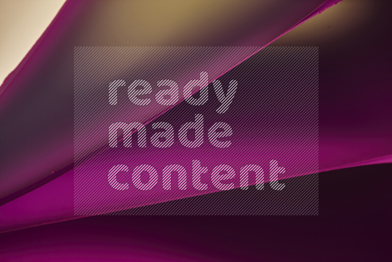 An abstract art piece displaying smooth curves in warm and cold gradients created by colored light