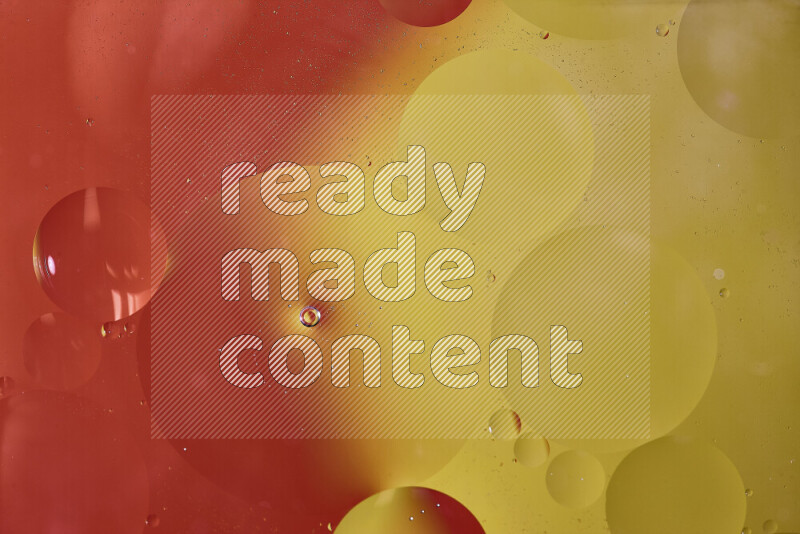 Close-ups of abstract oil bubbles on water surface in shades of orange and yellow