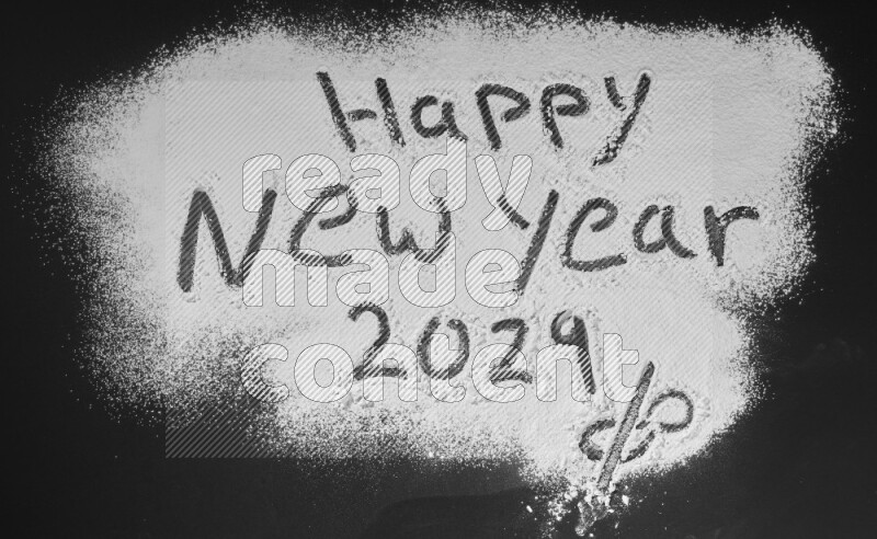 A sentence written with powder on black background