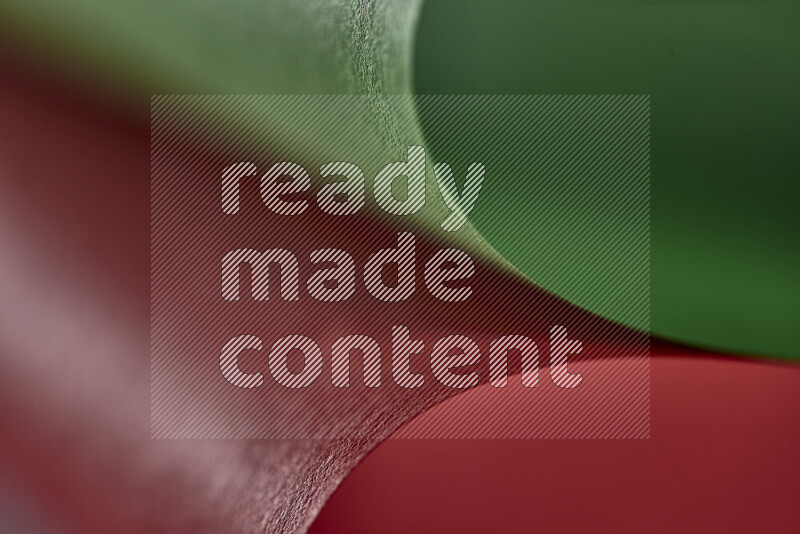 فن تجريدي يعرض المنحنيات المرتبة للأوراق باللون الأحمر والأخضر