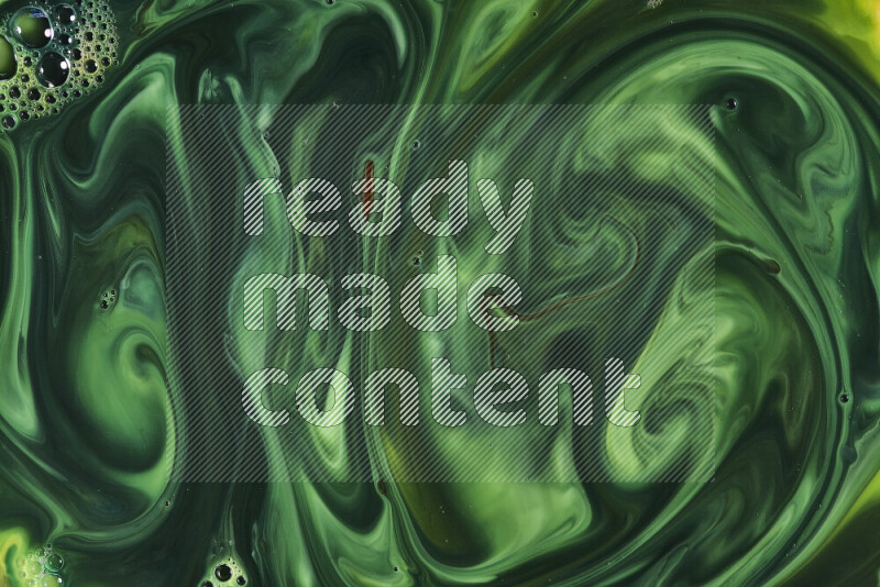 A close-up of abstract swirling patterns in green gradients