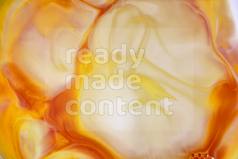 A close-up of abstract swirling patterns in orange, red and white