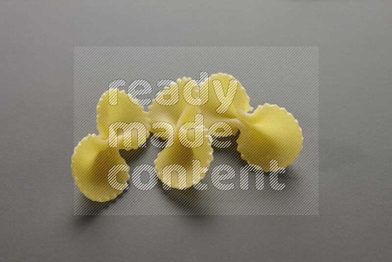 Fiocchi pasta on grey background