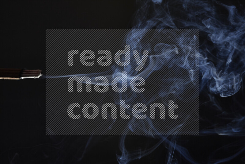 Motion of wavy smoke isolated on dark background