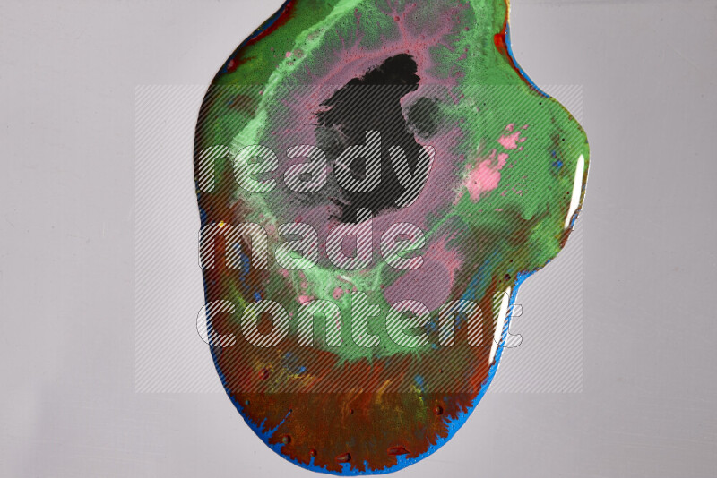 Close-ups of assorted colors blending on a grey background