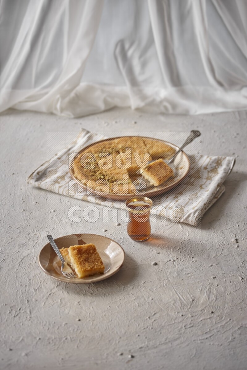 Konafa with tea in a light setup