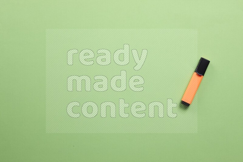 Multicolored highlighter pens on green background