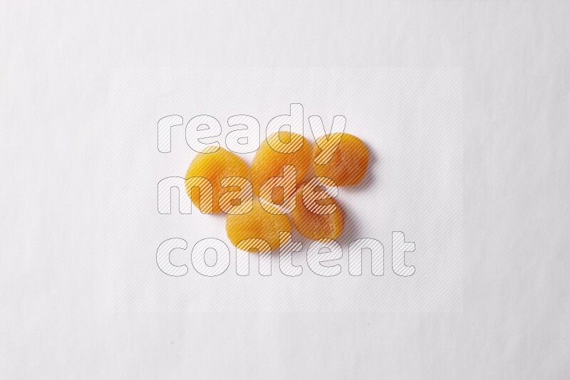 Dried apricots on white background