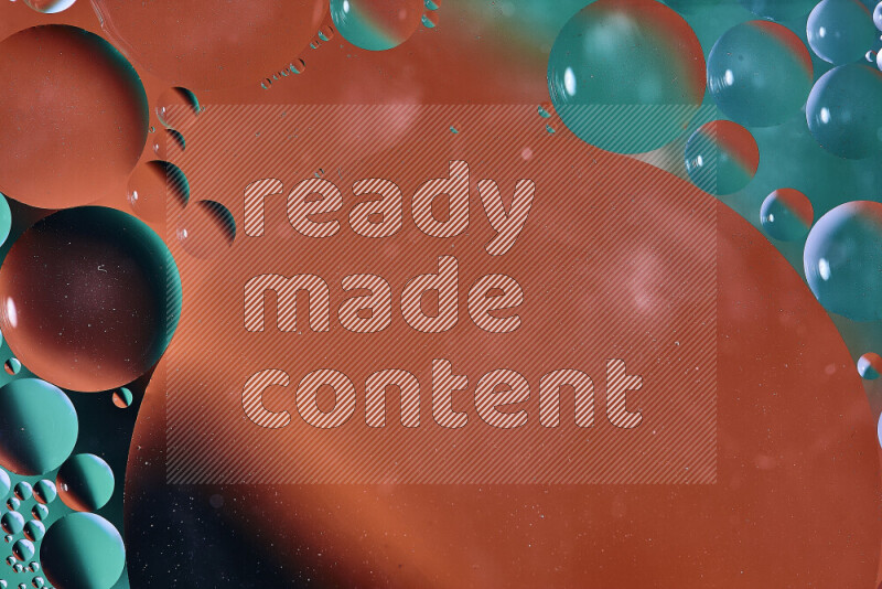 Close-ups of abstract oil bubbles on water surface in shades of green and orange