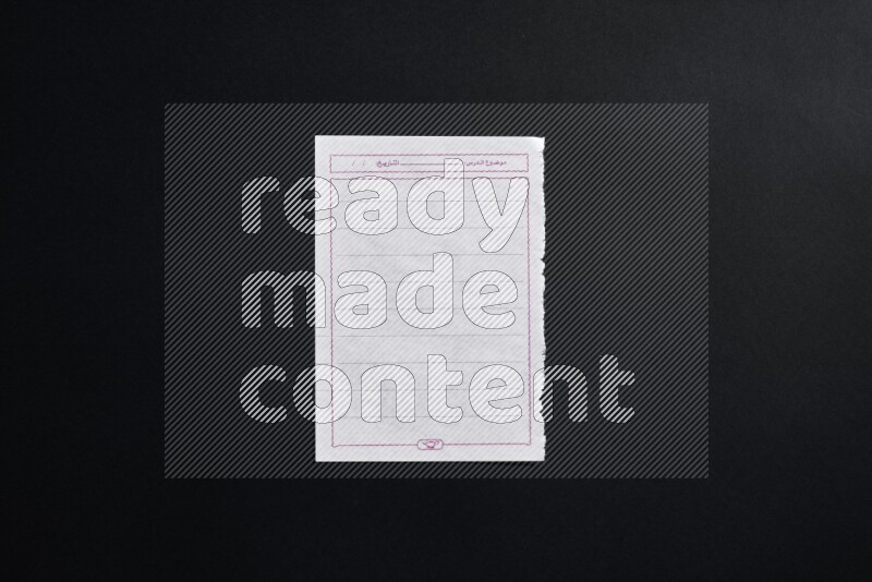 Notebook sheet on black background
