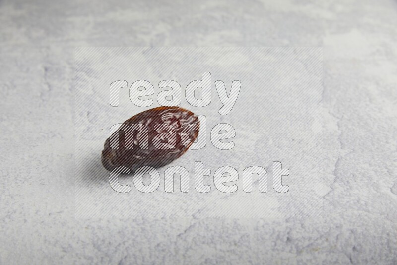 one madjoul date on a light grey background