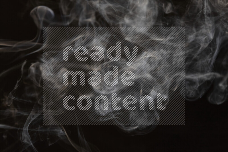 Motion of wavy smoke isolated on dark background