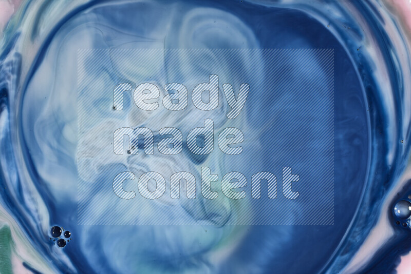 A close-up of abstract swirling patterns in blue and white