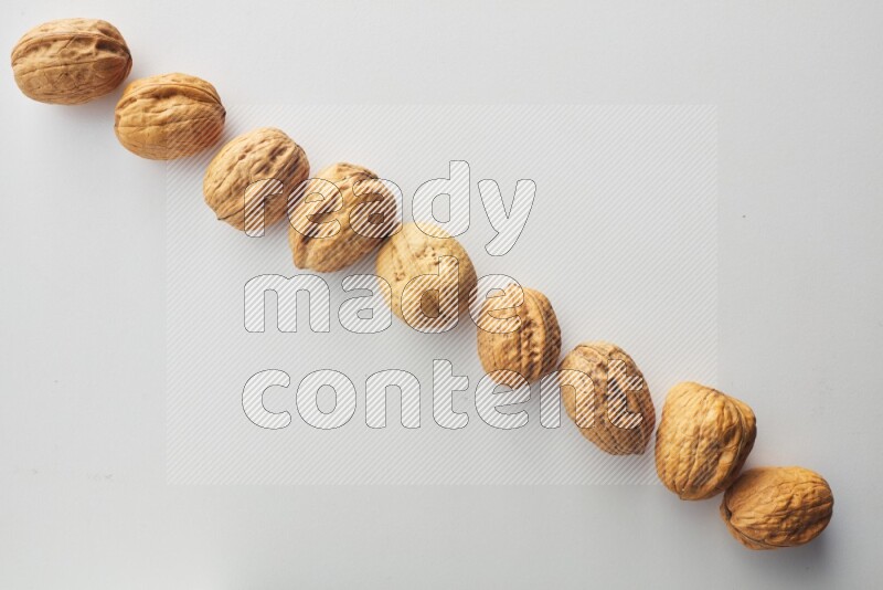 Top-view shot of walnut on white background