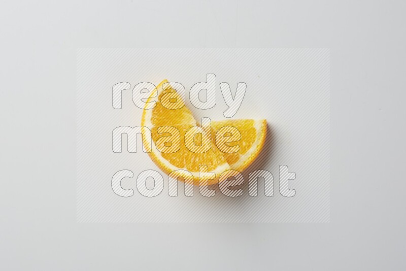 Two halves of an orange slices on white background