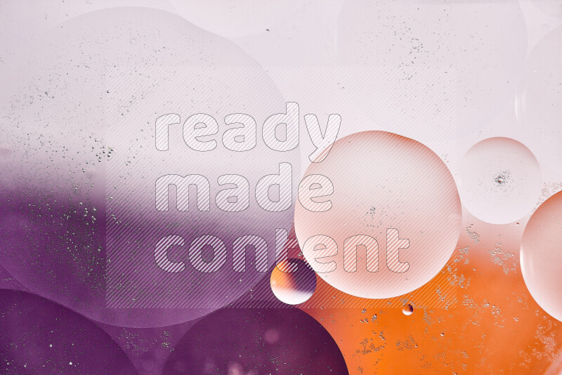 Close-ups of abstract oil bubbles on water surface in shades of white, orange and purple