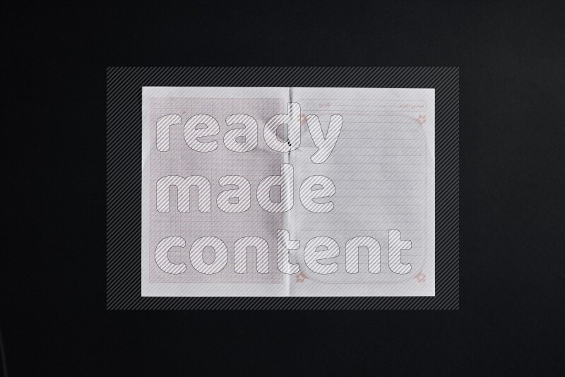 Notebook sheet on black background