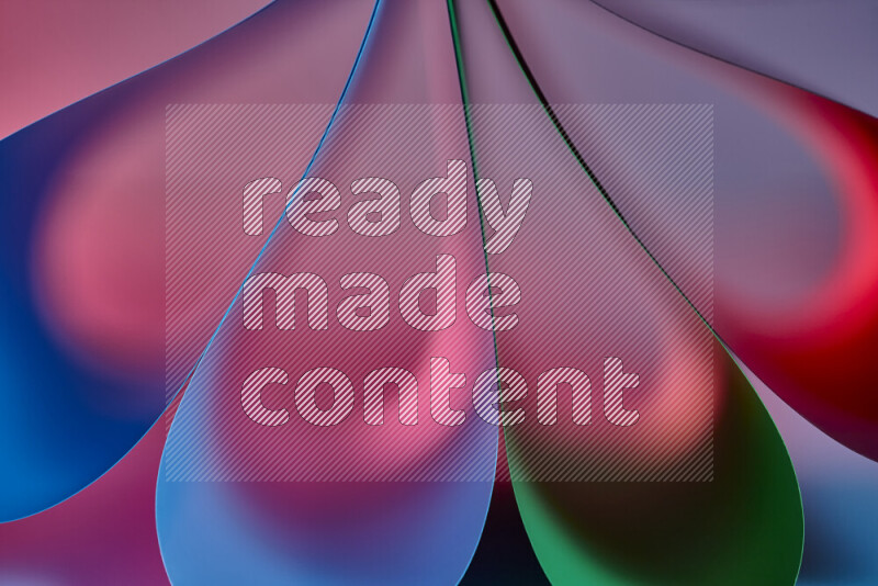 An abstract art piece displaying smooth curves in colorful gradients created by colored light