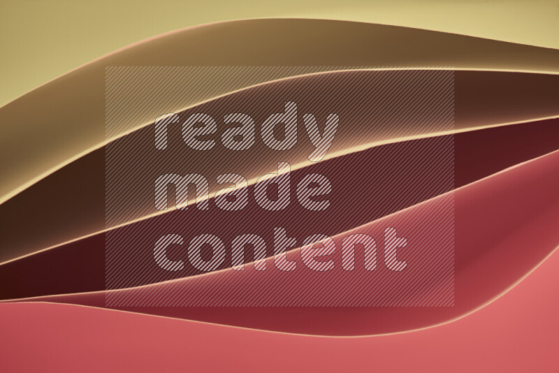 هذه الصورة تعرض تكوين فن الورق التجريدي مع منحنيات ورقية بتدرجات اللون الأصفر والأحمر والبني المكونه بواسطة الضوء الملون