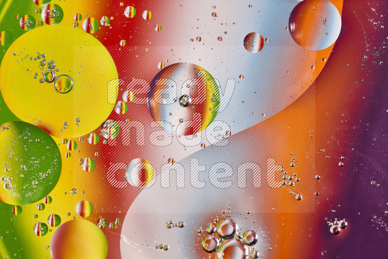 Close-ups of abstract oil bubbles on water surface in multicolors