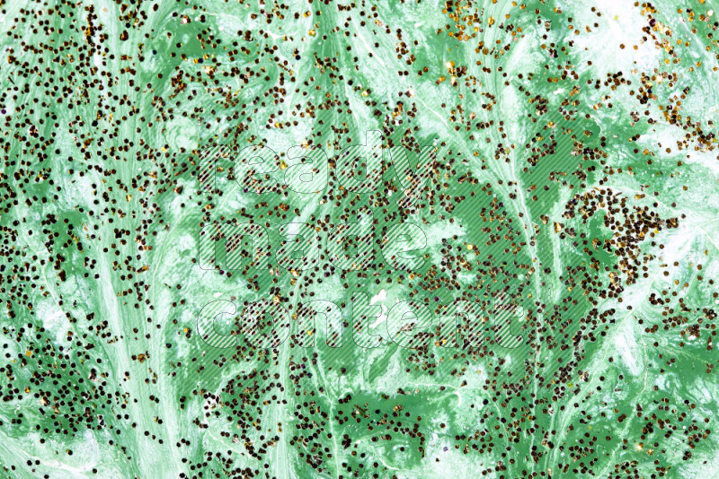 Abstract colorful background with mixed of green and white paint colors with scattered gold glitter