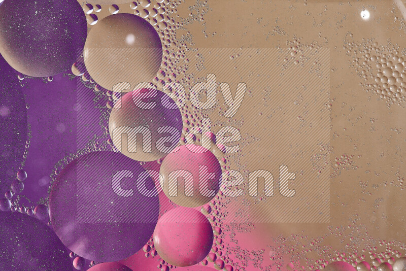 Close-ups of abstract oil bubbles on water surface in shades of brown, purple and pink