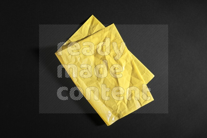 Colored plastic textures on black background