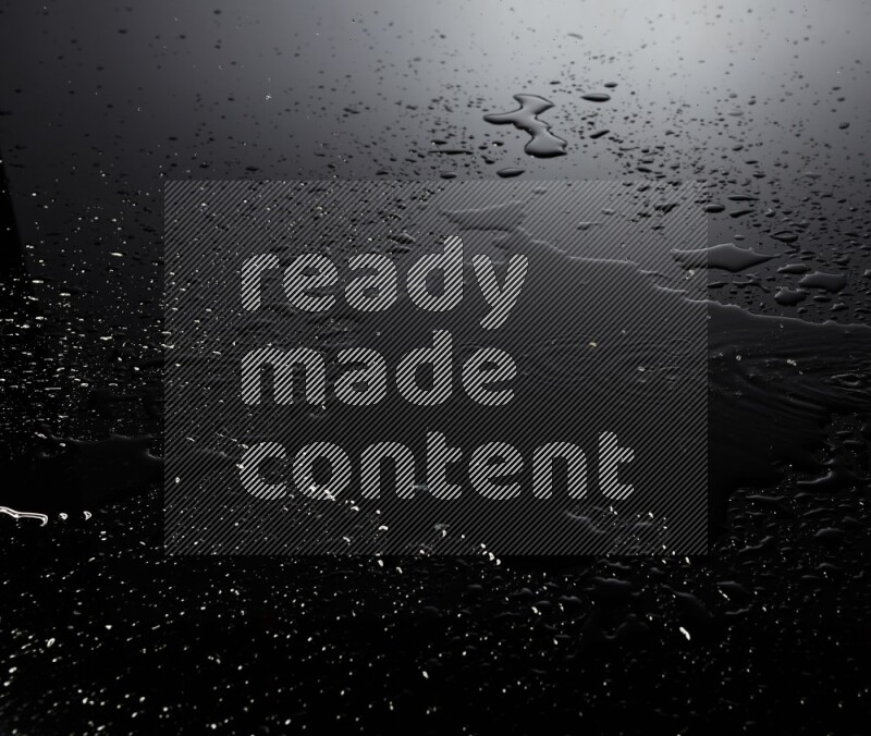 water drops, and droplets on black background