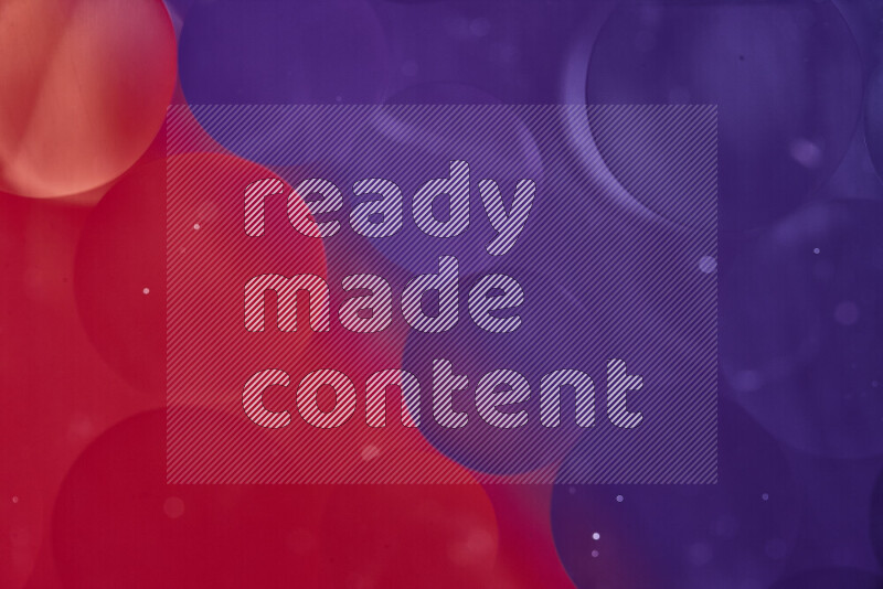 Close-ups of abstract oil bubbles on water surface in shades of red and purple