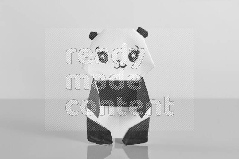 Origami animals on grey background