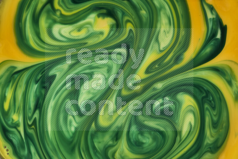 A close-up of abstract swirling patterns in orange and green