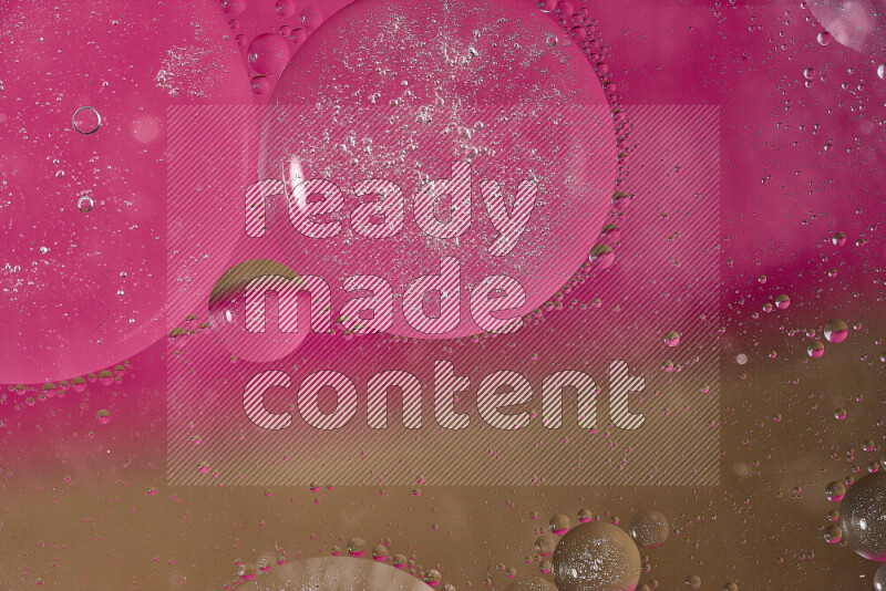 Close-ups of abstract oil bubbles on water surface in shades of pink and brown
