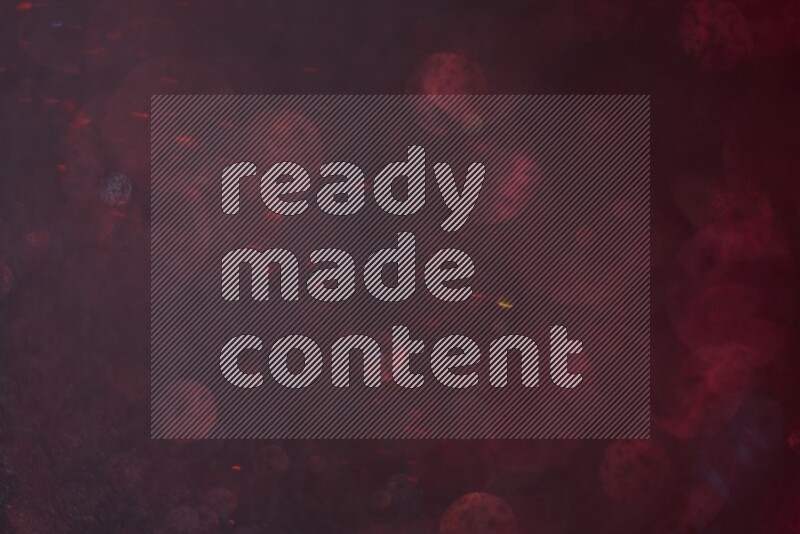 Red glitter powder isolated on black background