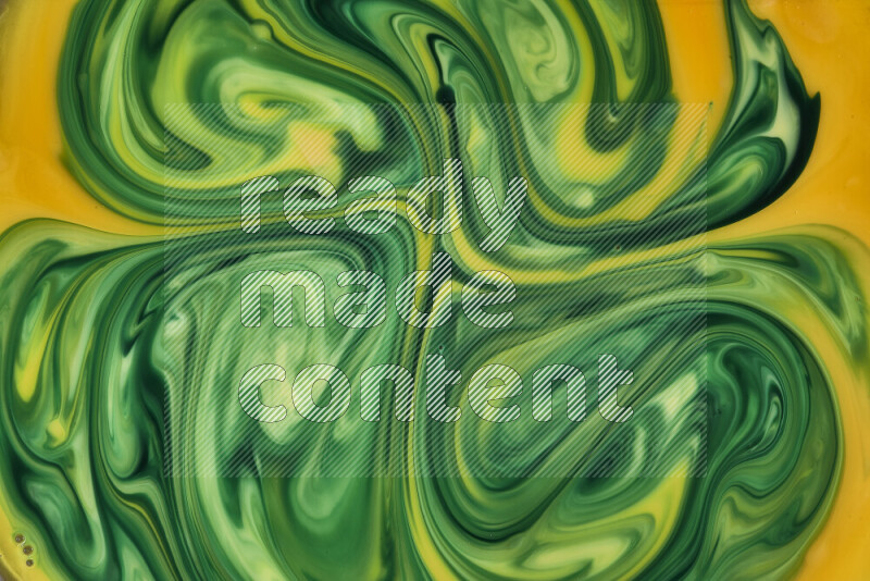 A close-up of abstract swirling patterns in orange and green
