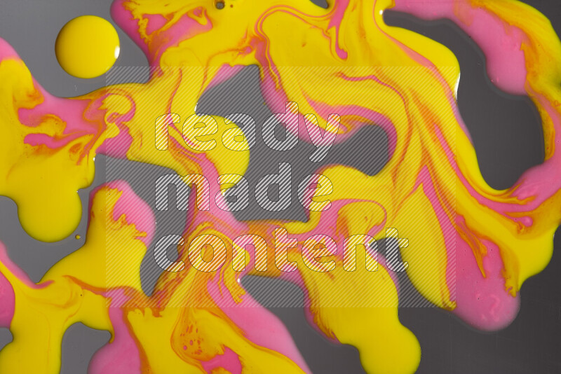 Abstract colorful background with mixed of pink and yellow paint colors