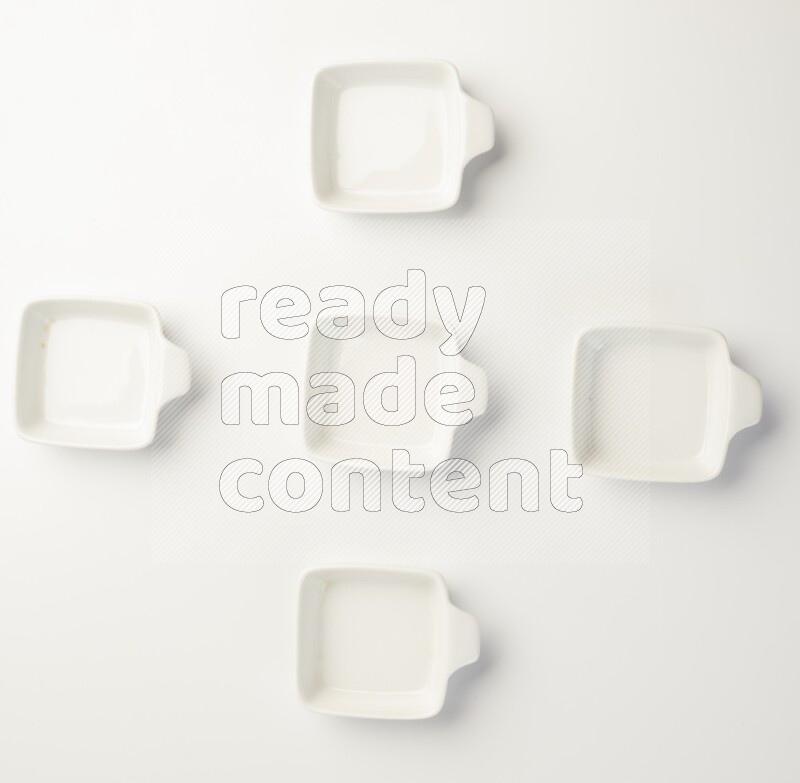 white ceramic square sauce dish on white countertop
