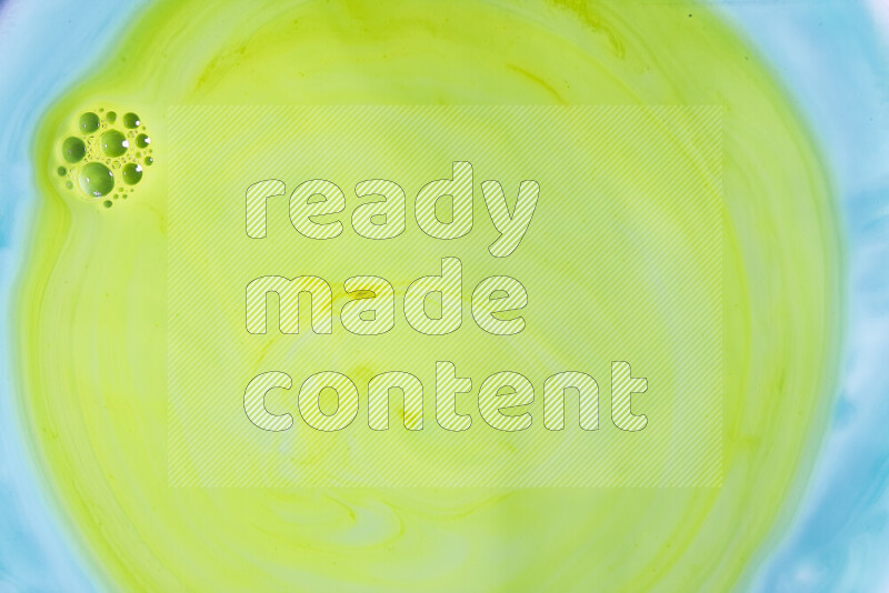 A close-up of abstract swirling patterns in green gradients