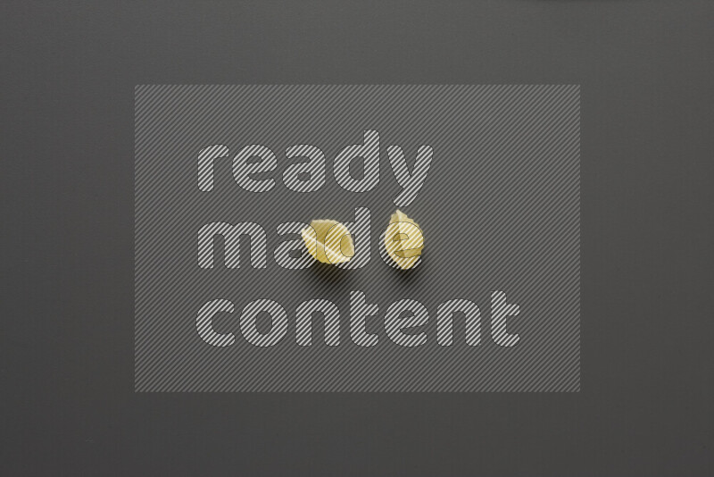 Shells pasta on grey background