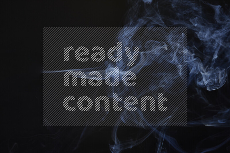 Motion of wavy smoke isolated on dark background