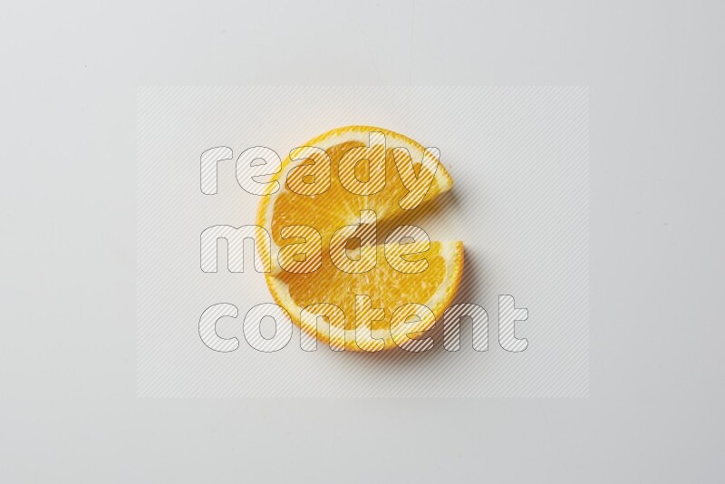 Two halves of an orange slices on white background