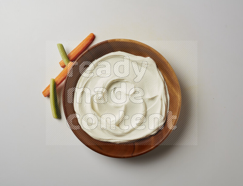 Plain Lebnah in a wooden plate on a white background