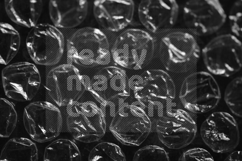 Bubble wrap texture on black background
