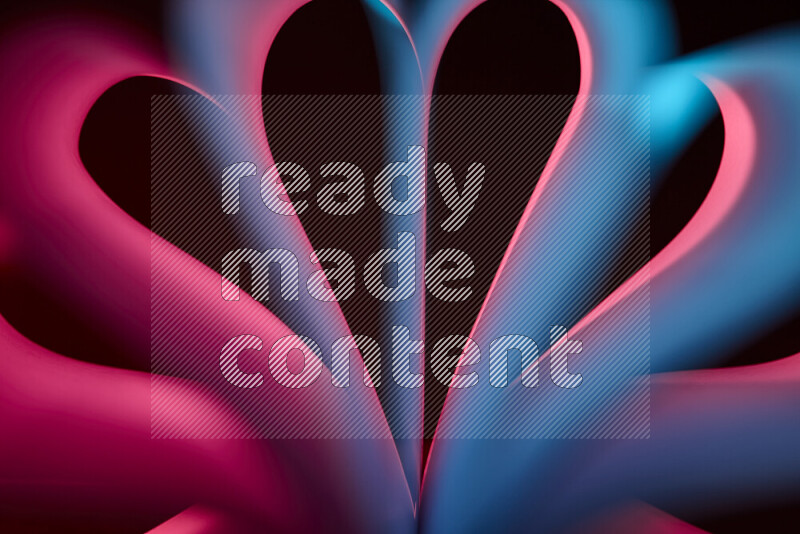 An abstract art piece displaying smooth curves in blue and red gradients created by colored light