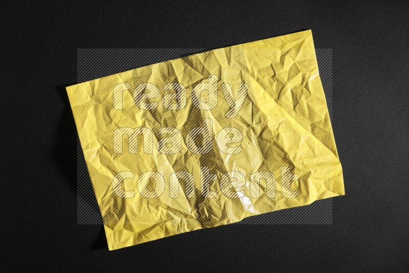 Colored plastic textures on black background