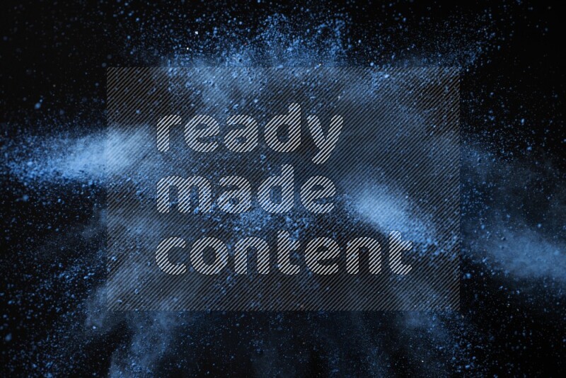 Blue powder explosion on black background